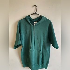 Green hoodie with sleeves cut off